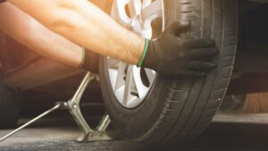 someone changing a tire